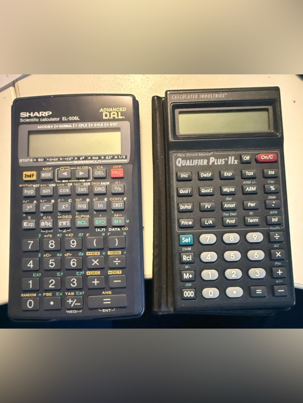 Sharp Scientific Calculator and Calculated Industries Real Estate Calculator